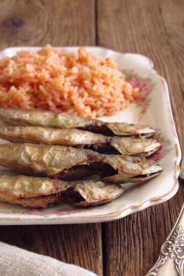 Portuguese Fried Horse Mackerel with Tomato Rice on a serving platter