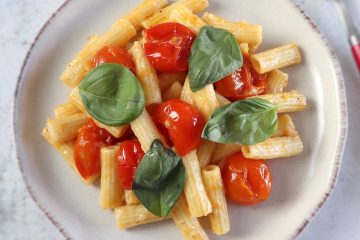Easy Parmesan pasta with cherry tomato on a plate